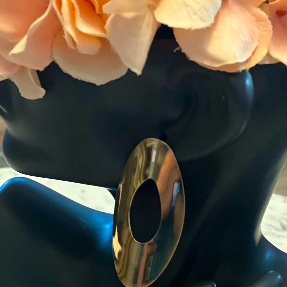 Sophisticated style. Gold exaggerated dangle asymmetrical shaped earrings.